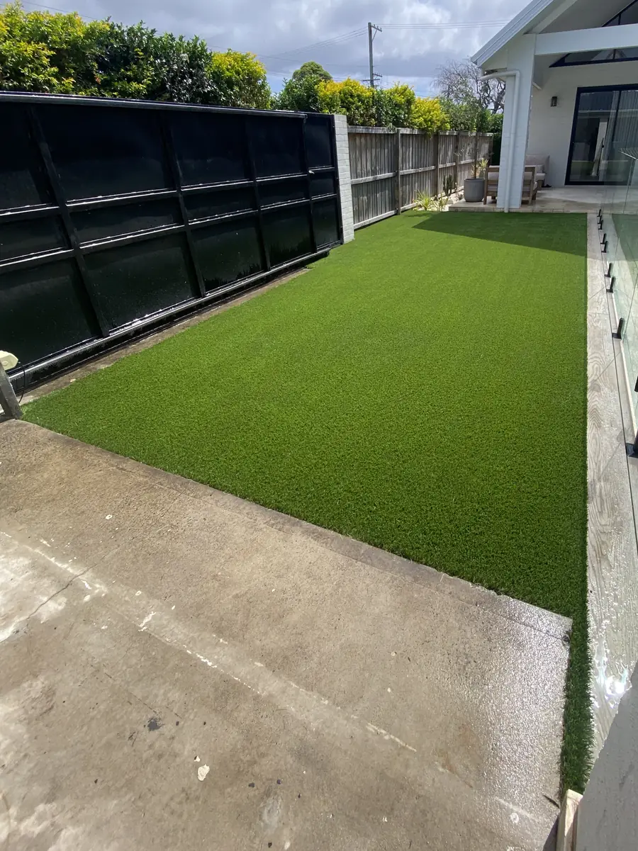 After: Patchy grass beside the pool